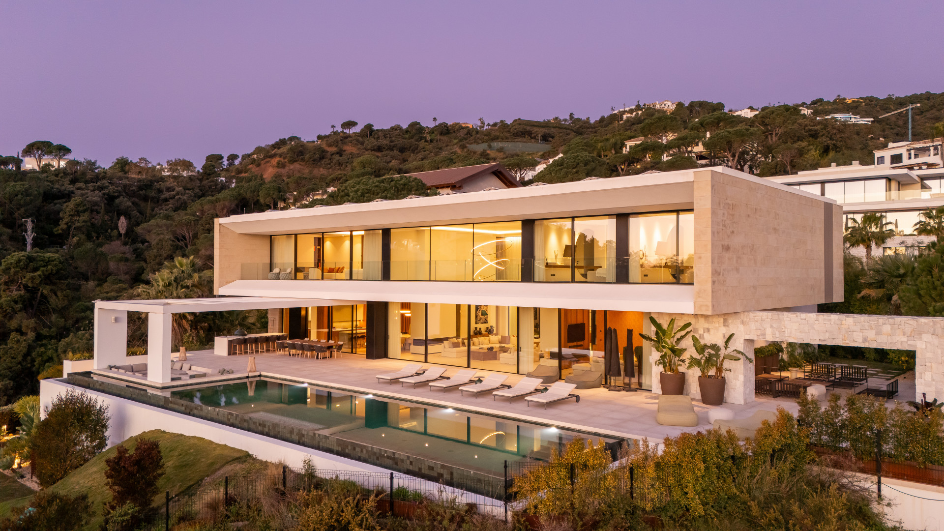 Casa De Canto is an exceptional seven bedroom contemporary estate in prestigious gated community of El Madronal
