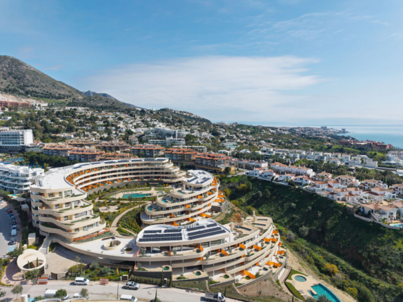 Experience refined coastal living in this brand-new luxury apartment set within the prestigious Higuerón Resort.