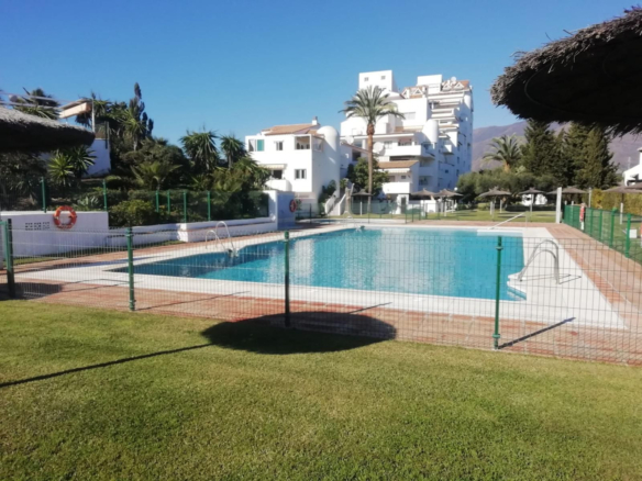 Prime Frontline Beach Apartment on Estepona's Serene Playa de Guadalobón