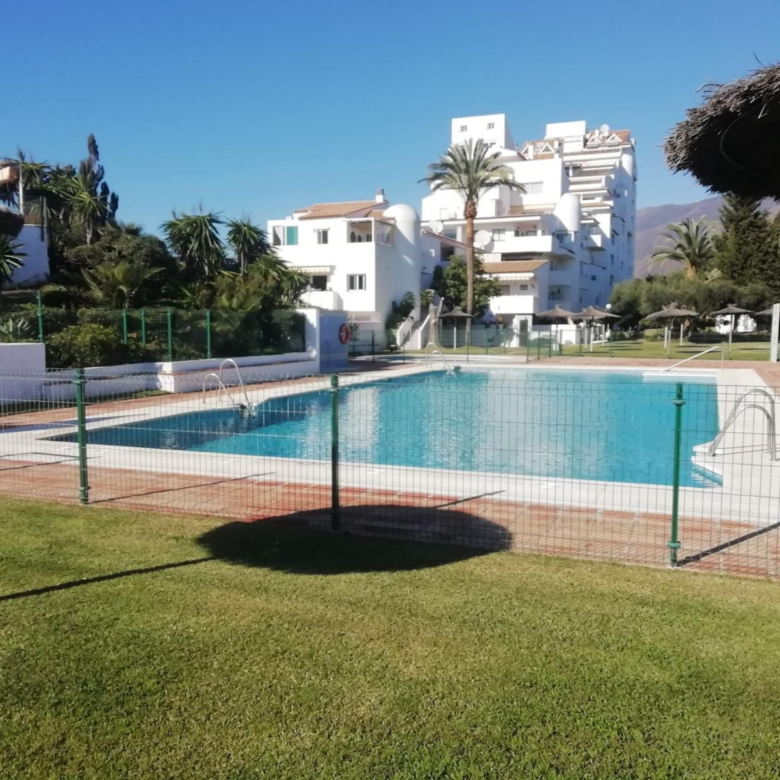 Prime Frontline Beach Apartment on Estepona's Serene Playa de Guadalobón