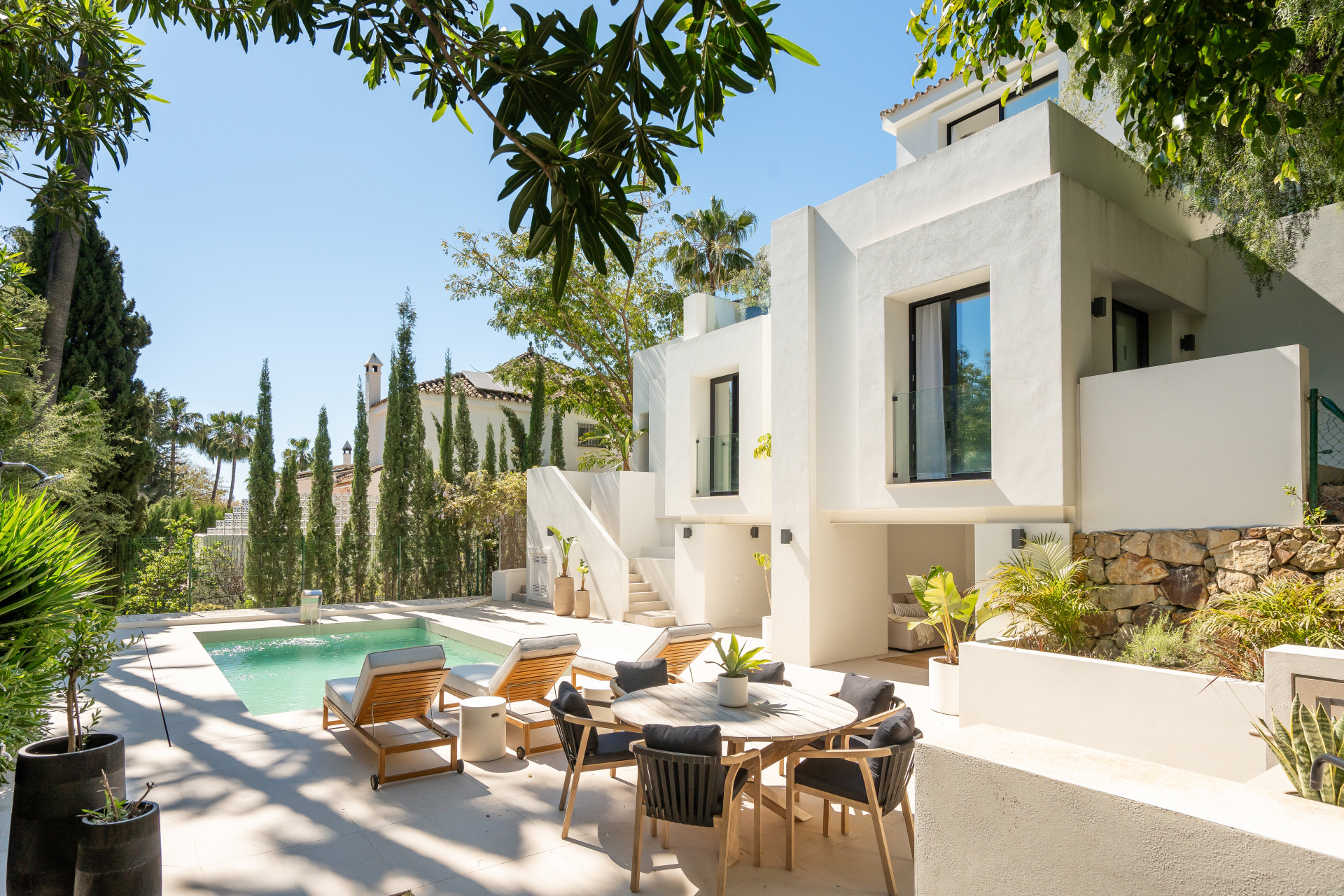Welcome to Villa Lucalle a contemporary masterpiece located in the picturesque grounds of Los Naranjos Hill Club in La Cerquilla Nueva Andalucia