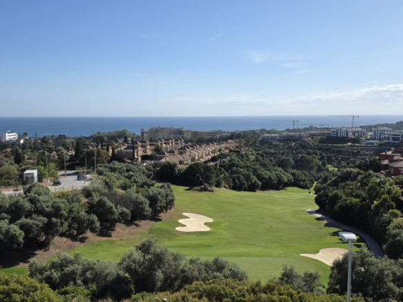 Exclusive Townhouse with panoramic sea, mountain, and golf course views, located in the highly sought-after Santa Clara Golf urbanisation.