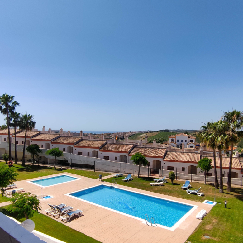 2-Bedroom Duplex with Solarium, Private Garage and Direct Pool Access in Royal Manilva