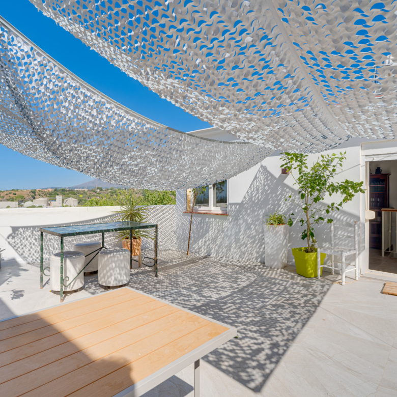 Unique five bedroom townhouse with rooftop terrace & excellent rental potential in Cancelada, Estepona
