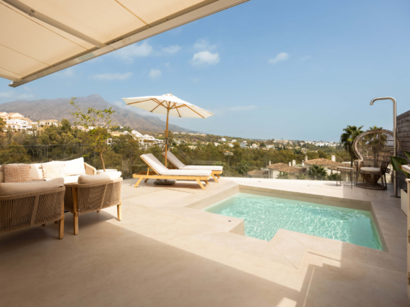Panoramic sea, lake and La Concha views meet modern design, a private plunge pool and stylish outdoor living in Les Belvederes, Nueva Andalucia.
