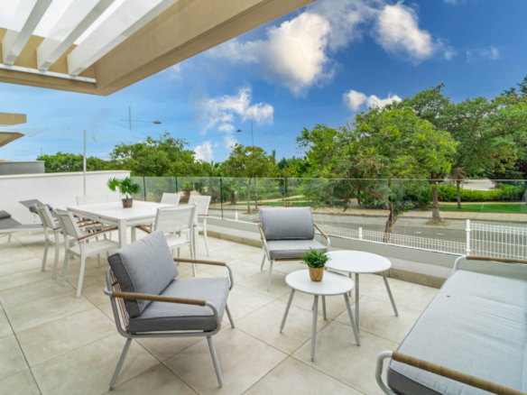 Contemporary Two-Bedroom Apartment with Expansive Terrace and Resort-Style Living