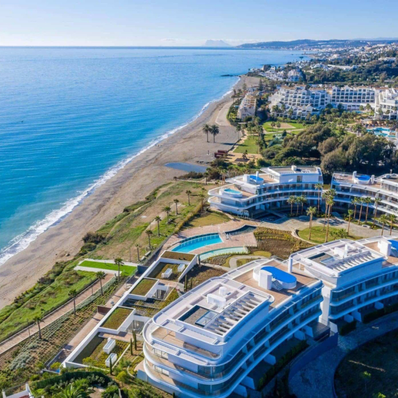 Luxurious beachfront apartment with private garden