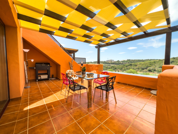 PENTHOUSE WITH LARGE TERRACE, SOLARIUM, AND OPEN VIEWS INCLUDING SIDE SEA VIEWS!