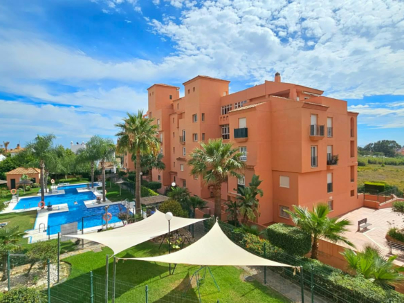 South-facing two-bedroom apartment with pool at Los Hidalgos Golf, Manilva.